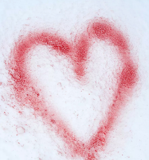 Heart painted onto snow